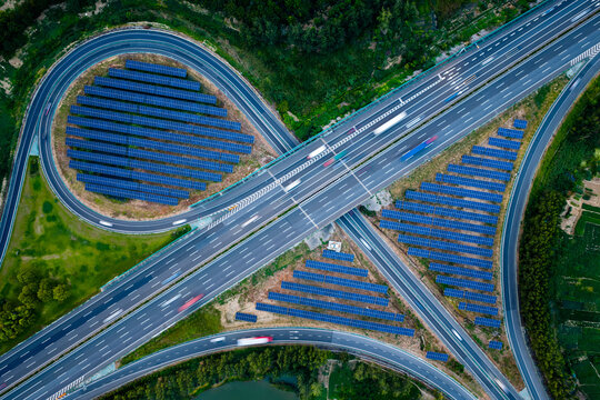 Aerial View of Highway Interchange with Solar Panels