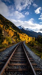 Fototapeta premium Autumn mountain railroad tracks