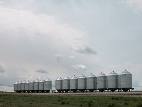 Row of Grain Silos on the Prairie