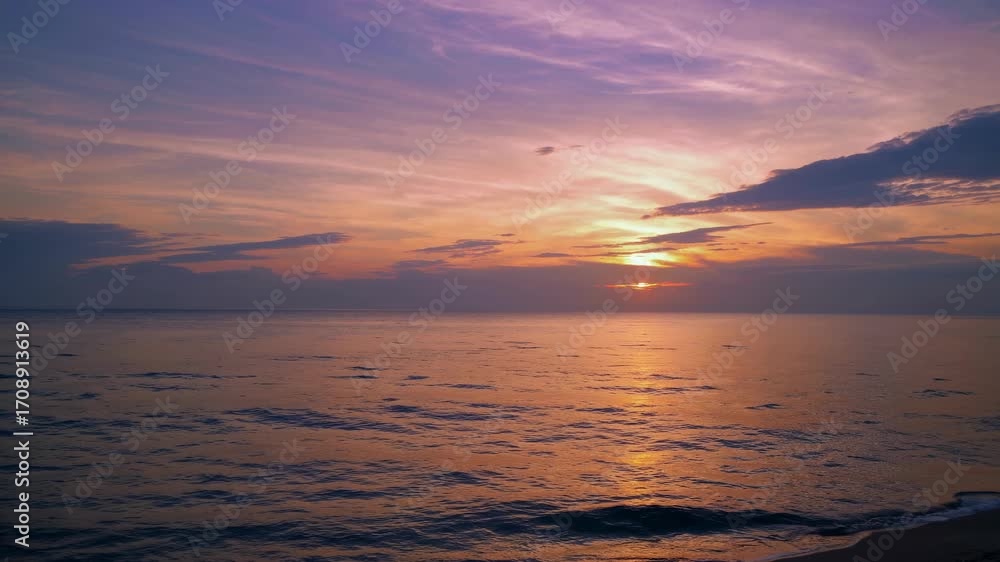 Aufkleber tranquil sunset over a calm ocean with vibrant colors in the sky, creating a serene atmosphere at du