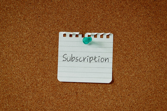 There is a piece of paper with the word Subscription. It is as an eye-catching image.