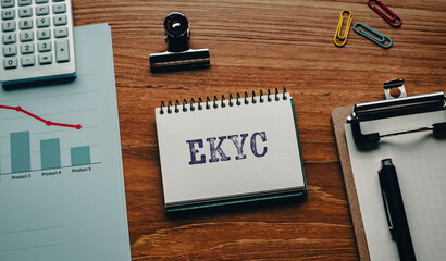 There is notebook with the word eKYC. It is an abbreviation for electronic Know Your Customer as eye-catching image.