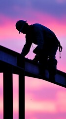 A construction worker in silhouette against a vibrant sunset, highlighting the hard work and dedication in the construction industry.