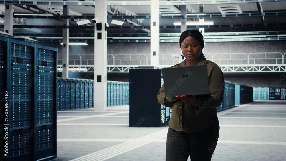 Poster data center engineer using laptop to develop disaster recovery plans, minimizing downtime. server fa