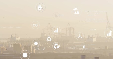 Dockside gantry cranes and container ships showing sustainability metric icons in hazy harbor