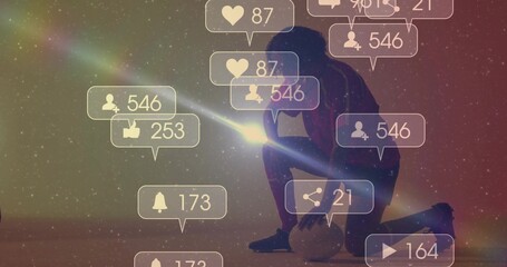 Shining smartphone beam kneeling athlete in sportswear lighting digital sky with icons, soccer ball