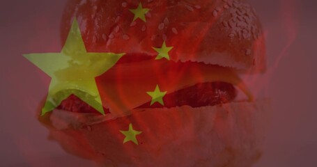 Showcasing hamburger featuring meat patty in poster with flames and Chinese flag overlay