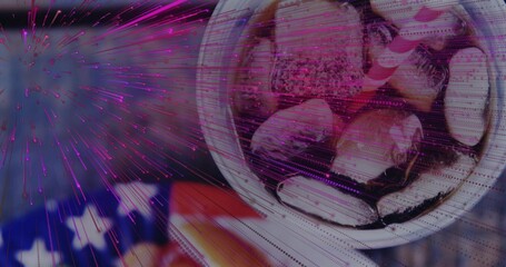 Naklejka premium Showing white bowl holding iced drink on US flag, magenta-purple streaks and scanlines, copy space