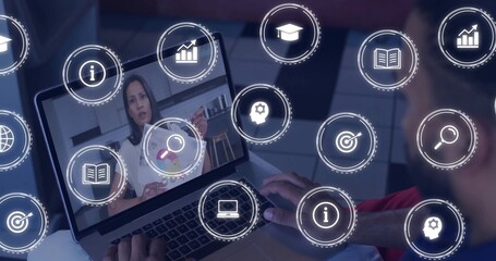 Man interacting with laptop screen at desk in home office with floating analytics icons overlay