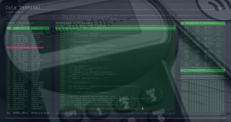 Displaying green-tinted terminal interface over dim desk, showing code view, tables and headphones