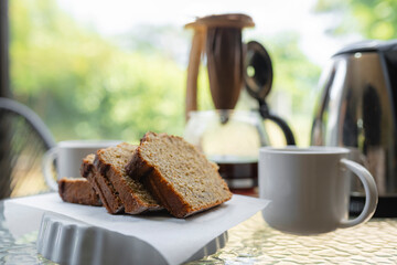 Homemade banana bread slices with coffee