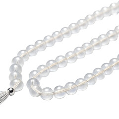 Fototapeta premium Clear Crystal Prayer Beads with Tassel on Black Background Keywords: prayer beads, mala, rosary