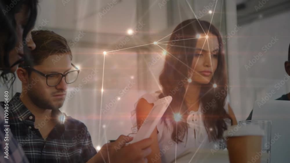 Poster coworkers scrolling smartphones and tablets in office sparking network overlay linking for teamwork