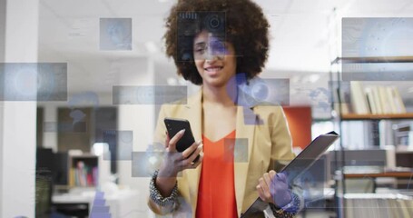 Business manager scrolling smartphone while holding clipboard at office processing AR data visuals - Powered by Adobe