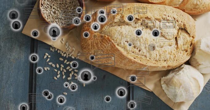 Camera pulling back revealing rustic bread assortment on parchment while icons drifting for demo