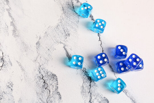 Blue dices on light background
