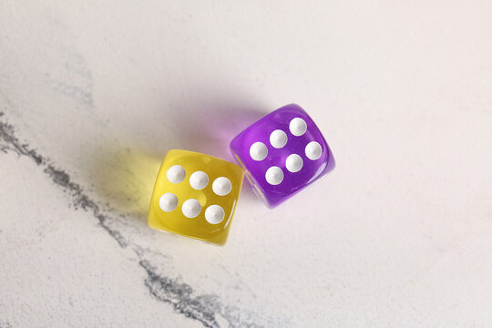 Different dices on light background