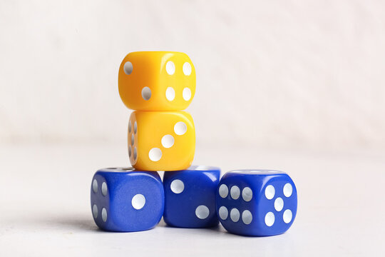 Different dices on light background