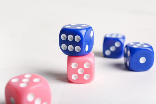 Different dices on light background