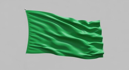 A blank green flag waving in the wind on a metal flagpole. A 3D render representing environmentalism, ecology, or a go-ahead signal.