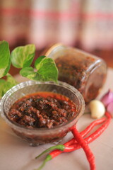 A traditional Indonesian fried chili sauce, spicy and mouth-watering. Rich in onions and chilies. Stores well in a jar.