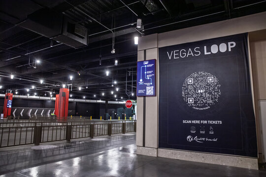 LAS VEGAS - AUGUST 21, 2024: Interior entry area for the Vegas Loop at Resorts World instructing riders to scan for tickets. This project is associated with Elon Musk and the boring company.