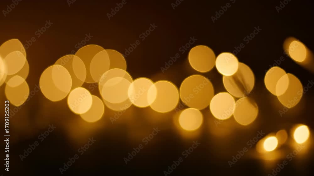 Wall mural abstract golden bokeh shimmering waves gently pulsing across the screen, a seamless and captivating 