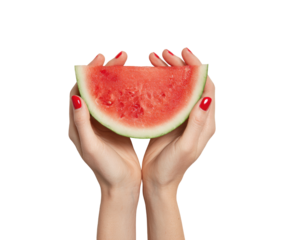 Woman's hands hold a watermelon slice