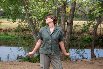Happy woman seen in nature