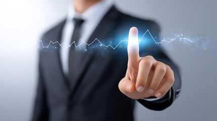A business professional interacts with a digital interface, showcasing technology and innovation through a touchpoint represented by a dynamic graph.