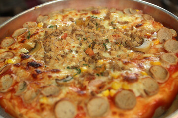 pizza with mushrooms and tomatoes