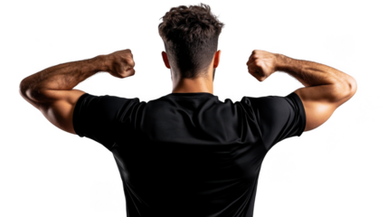 Back view of a muscular man in a black shirt flexing his arms against a black background in studio light