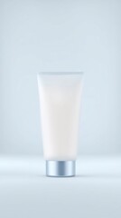 Mock up of a cosmetic tube with a sleek design, featuring a silver cap, placed against a soft gradient background, ideal for beauty product branding and marketing purposes
