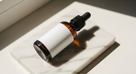 Minimalist cosmetic branding mockup featuring a brown glass serum bottle with a dropper on a sunlit marble slab