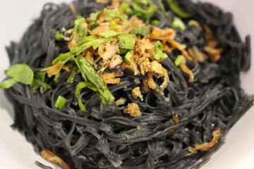 bowl of black noodles