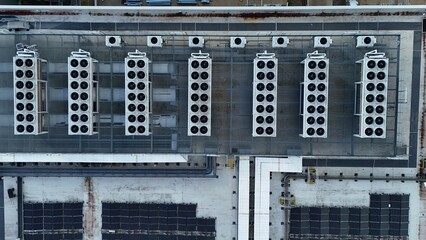 Top down aerial view of data centre cooling fans, turbines, information computer cooling air...