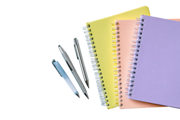 Pastel-colored notebooks and pens