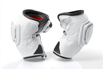 Modern white and black knee protection pads for sports, safety, and design concepts, perfect for action, movement, and active lifestyle projects