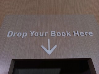 Box for returning borrowed books and donating free books at the library