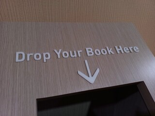 Box for returning borrowed books and donating free books at the library