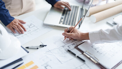 Architecture drawing on architectural project business architecture building construction Colleagues designer Planning Design on blueprint and compasses
