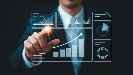 Businessman interacting with futuristic holographic financial charts and graphs displaying growth and data analysis
