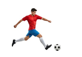 Obraz premium Dynamic Soccer Player Kicking a Ball Against a White Background