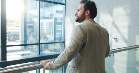 Thinking, employee and man with ambition, office or ideas for business growth, serious or corporate. Reflection, accountant and person with vision for career development, opportunity and wonder © FantiFlash/peopleimages.com