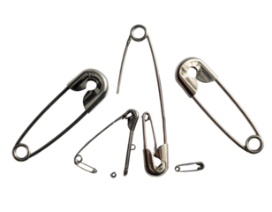 Set of assorted safety pins in different sizes isolated on transparent background PNG