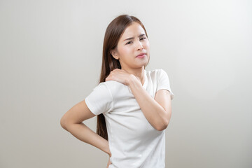 Pain body muscles stiff problem, asian young woman, girl painful with back, neck ache from work hand holding massaging rubbing shoulder hurt, sore on white background. Health care and medicine concept