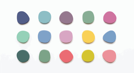 Fifteen colorful, smooth, pebble-like shapes arranged in a grid pattern on a clean white background, creating a vibrant and playful composition.