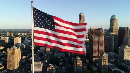 American flag over cityscape - Powered by Adobe