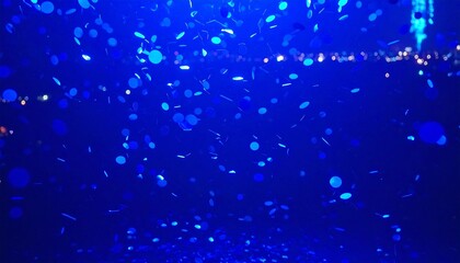 Blue confetti falling