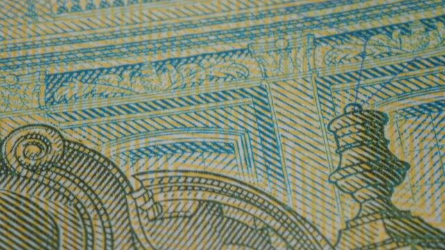 Close examination reveals the fine artistry and craftsmanship in Euro banknotes, showcasing historical figures and unique designs. Discover the beauty of currency.